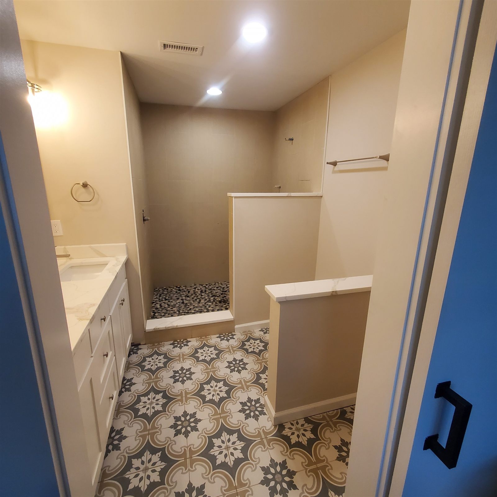 Quartz bathroom vanity and shower curb countertop
